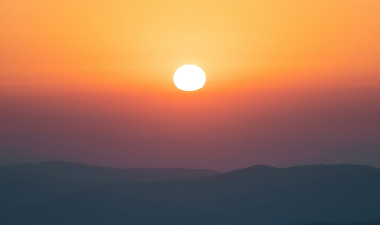 Sunset over layered Blue Ridge mountain ridges in Virginia